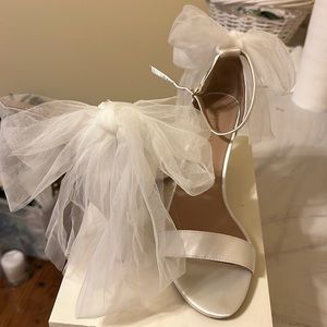 BHLDN Adjustable ankle strap buckle 
Satin tulle upper rubber sole
3" heel